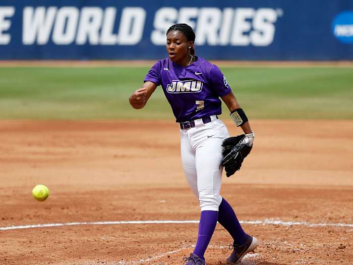 Jun 7, 2021; Oklahoma City, Oklahoma, USA; James Madison’s Odicci Alexander (3) delivers a pitch to Oklahoma during an NCAA Women’s College World Series semi finals game at USA Softball Hall of Fame Stadium.